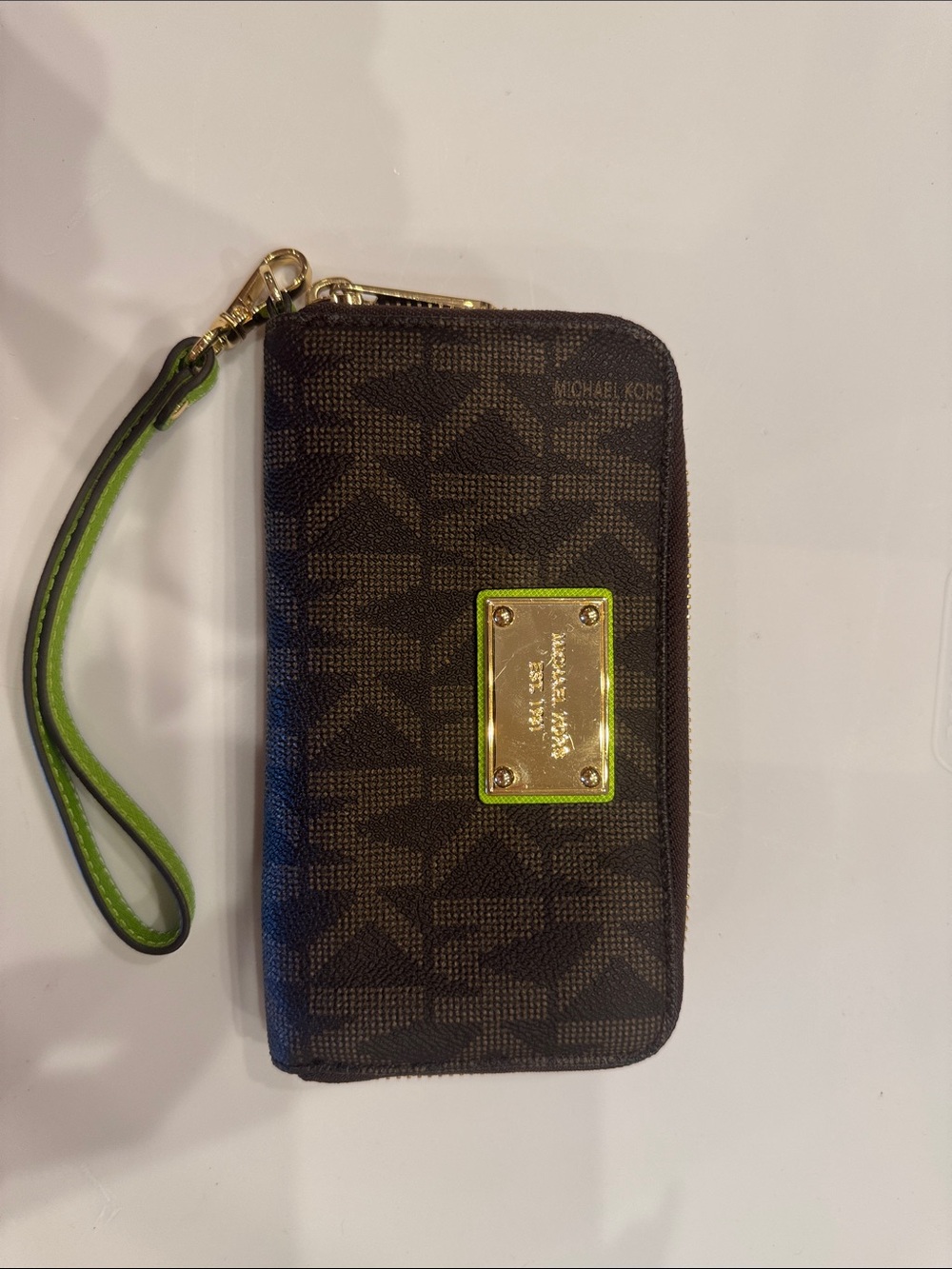 Michael Kors Brown Monogram Wristlet with Lime Accent